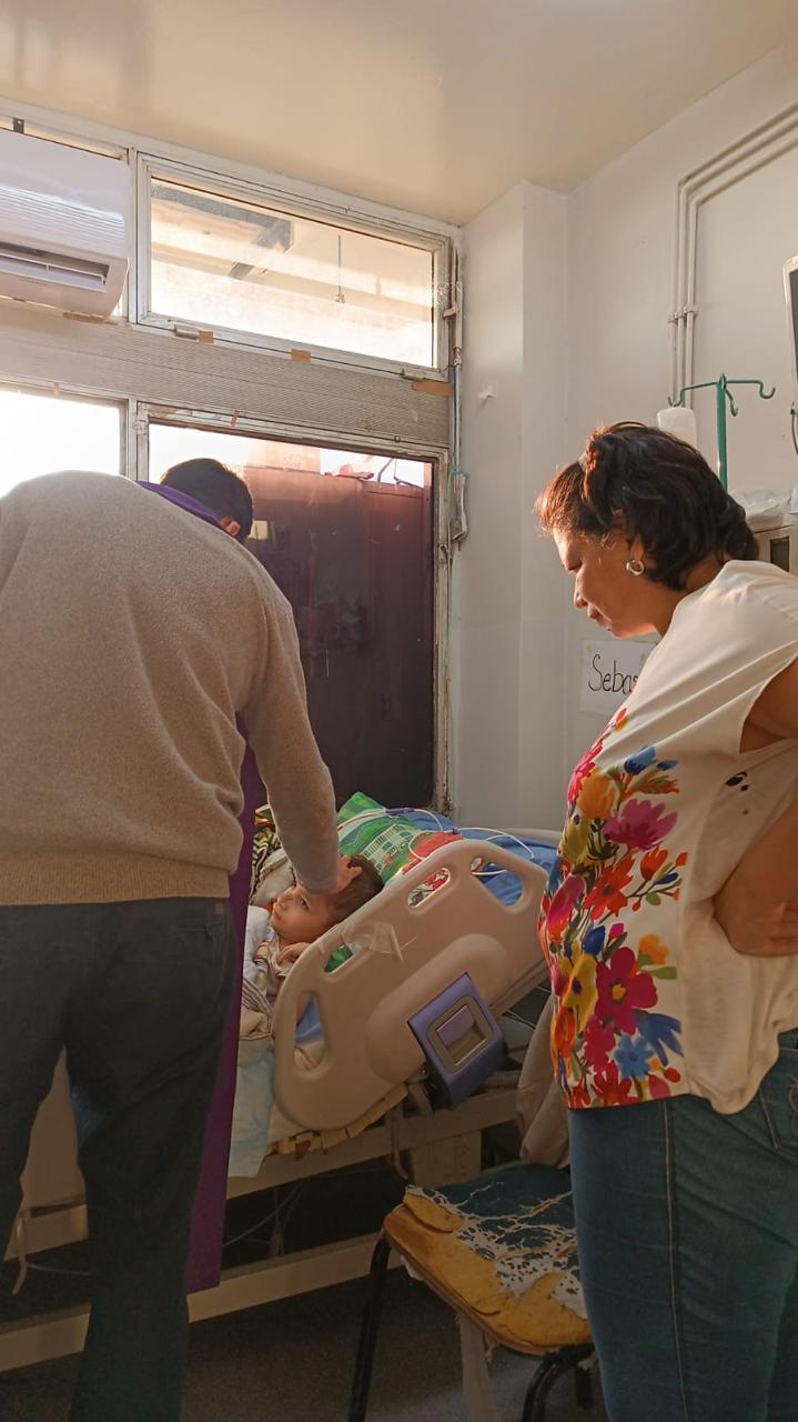 Misionera acompañando a un paciente
